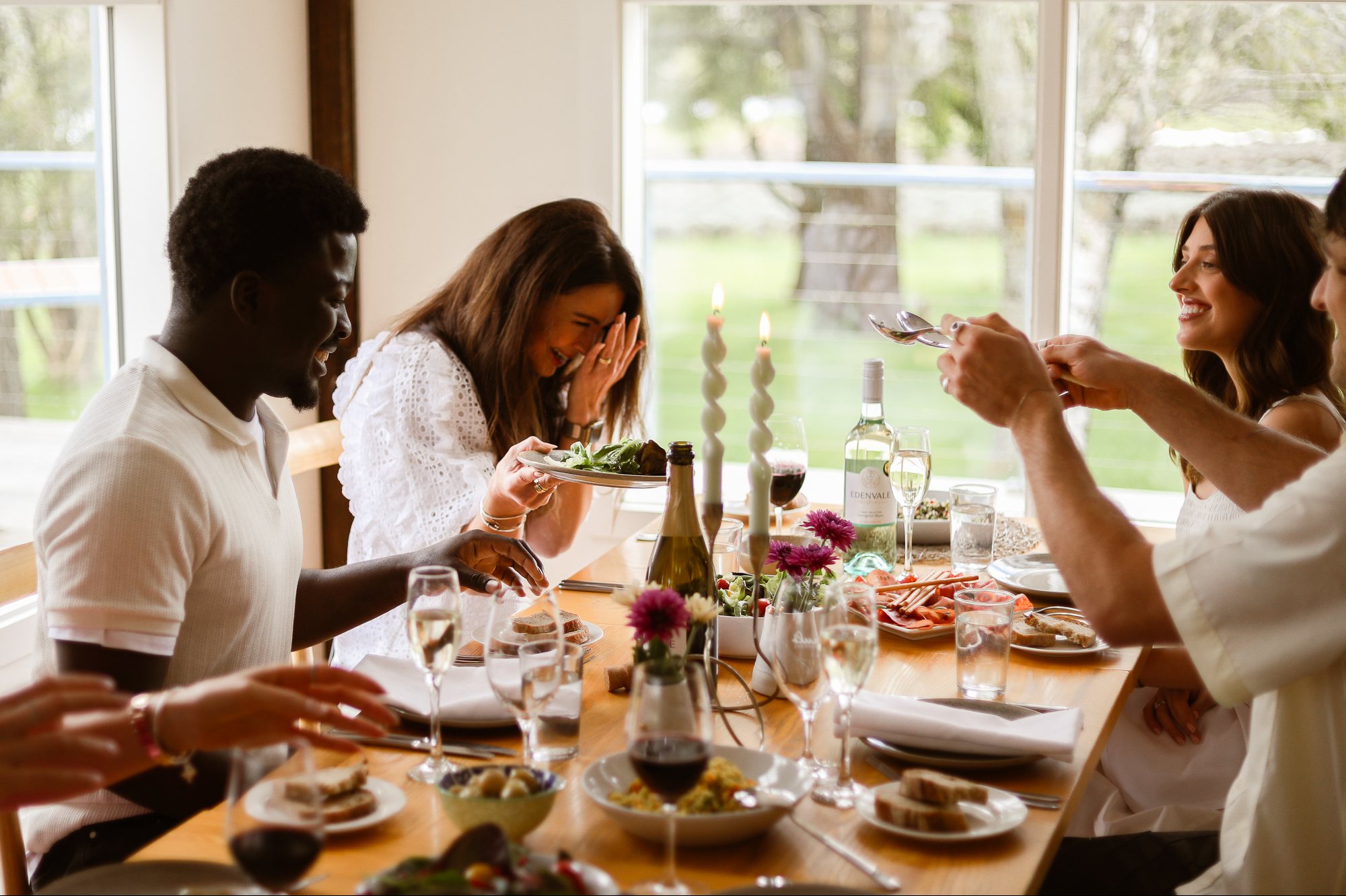 Friends sharing Edenvale non-alcoholic wines over a long lunch