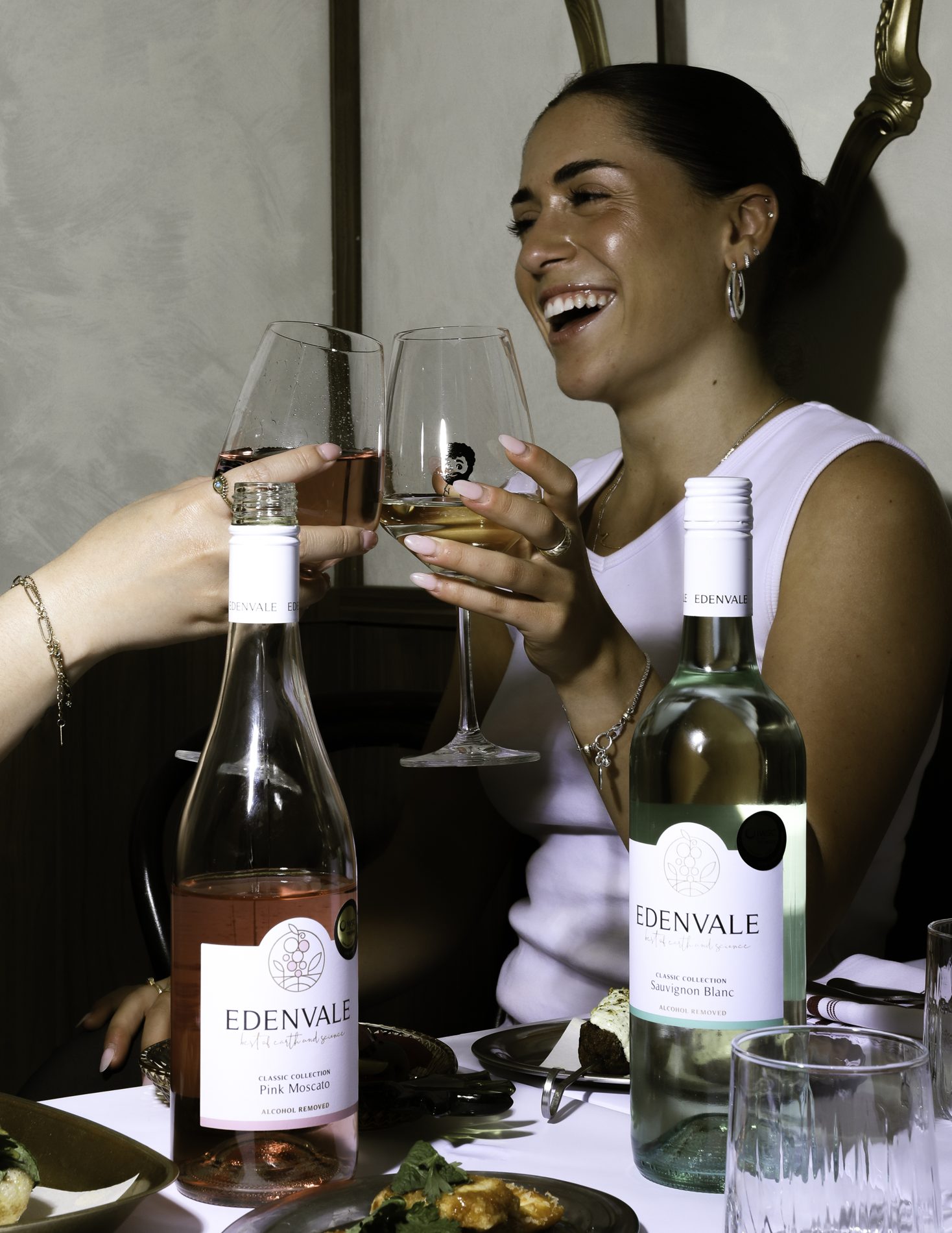 Edenvale Pink Moscato and Sauvignon Blanc on a dinner table