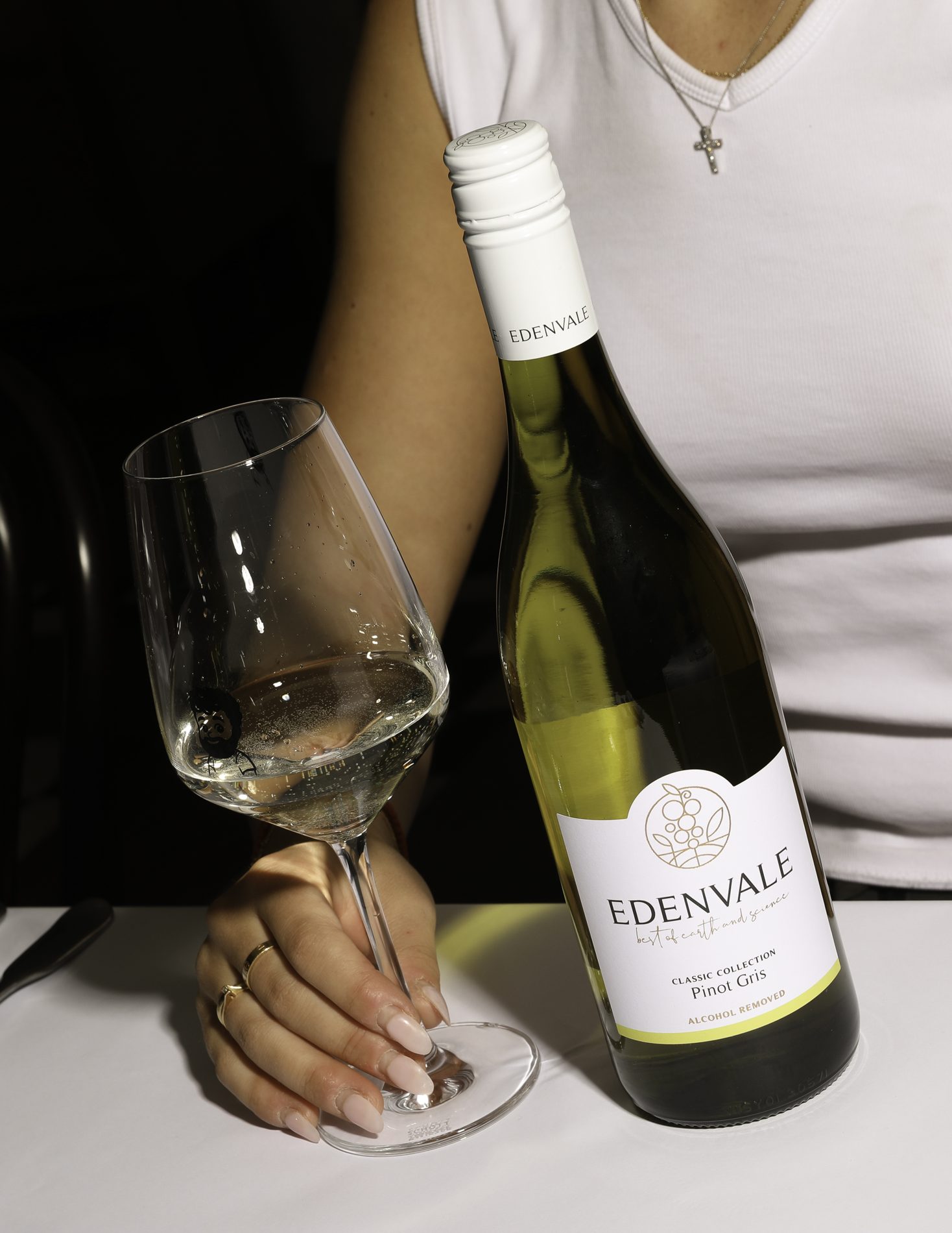 A glass and bottle of Edenvale Pinot Gris