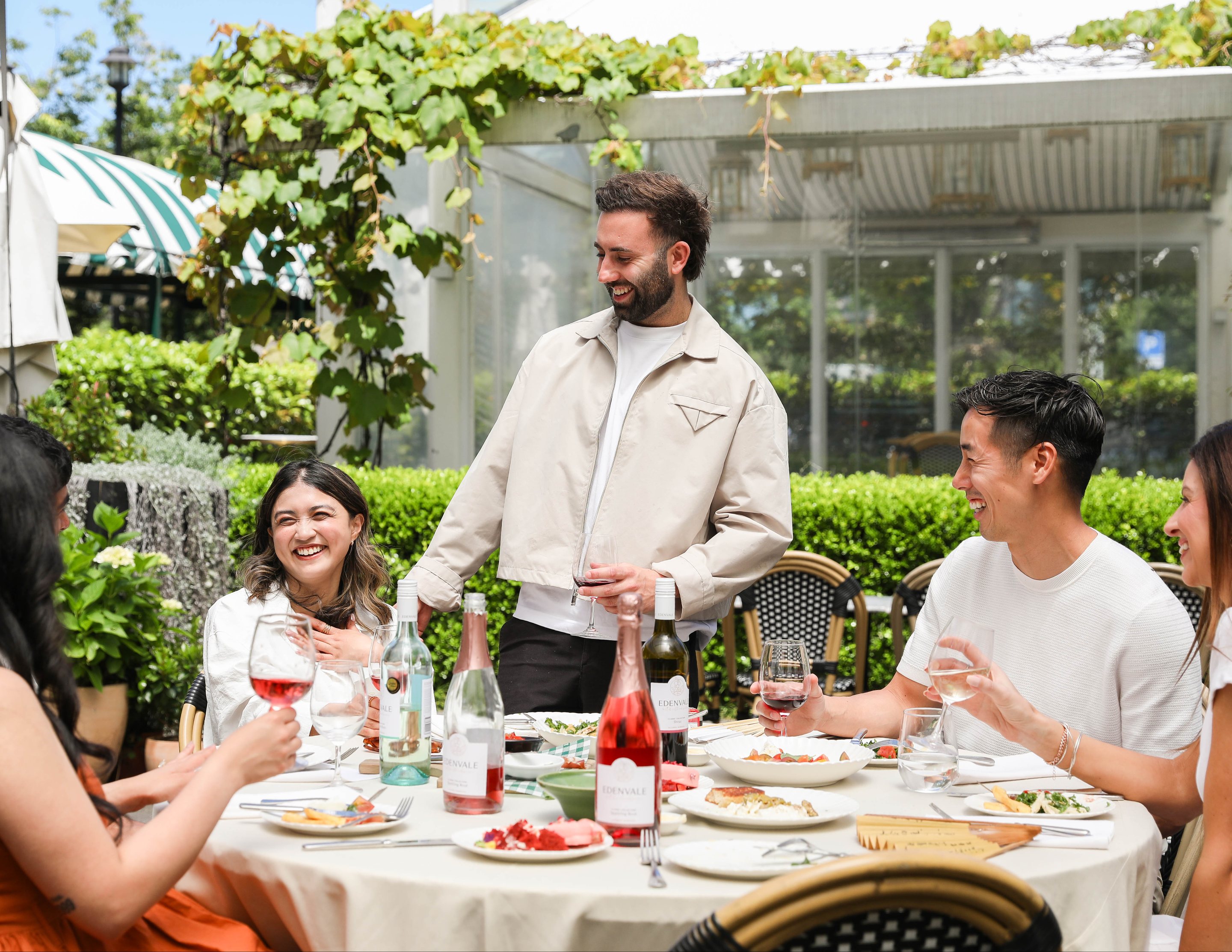 Friends sharing Edenvale red, white, ros&eacute; and sparkling wines over lunch
